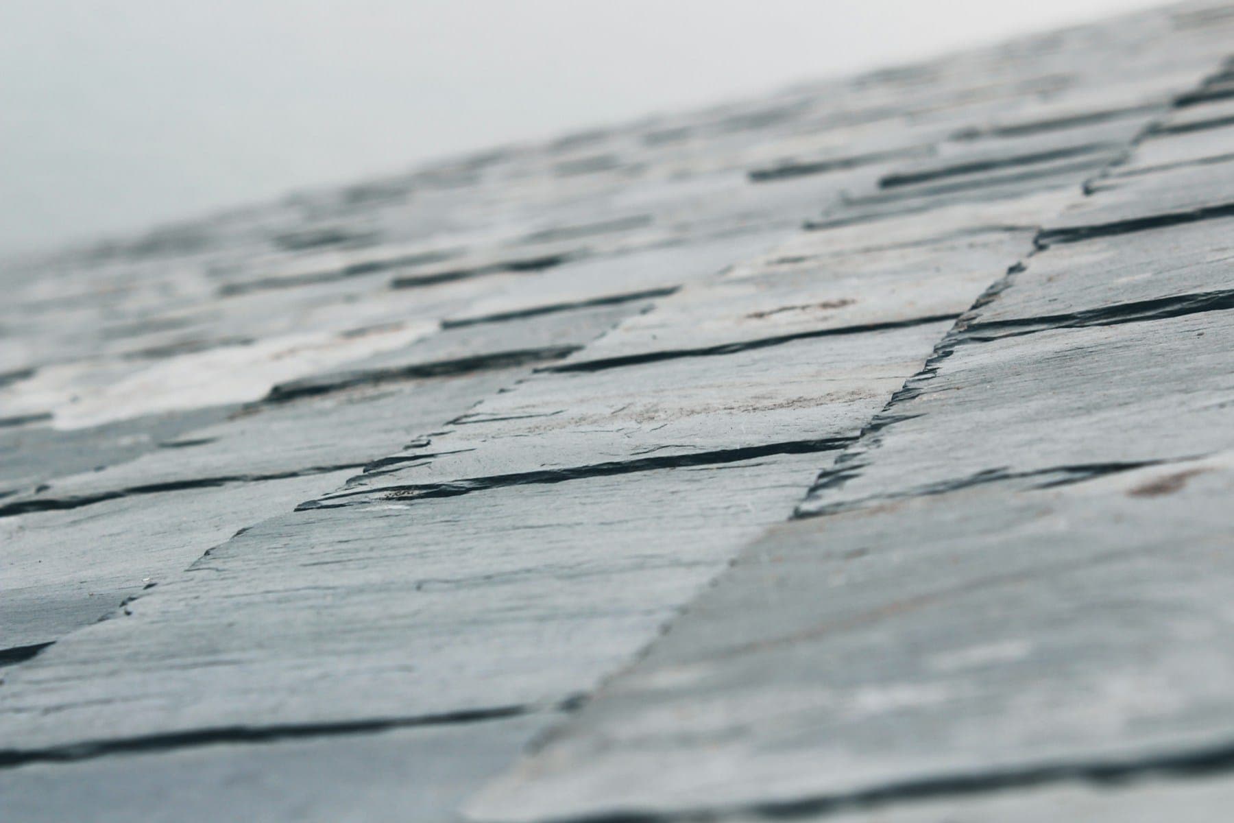 Courses of natural grey slate on a finished roof